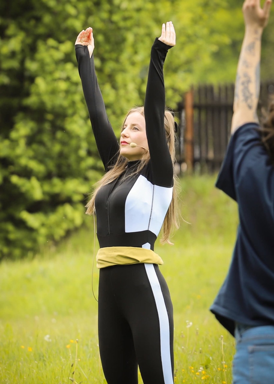 Beata leading an outdoor yoga session